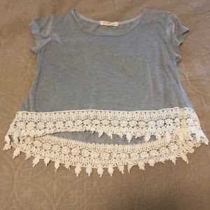Cute gray tee with lace detailing on the bottom
